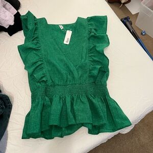 Green ruffle top